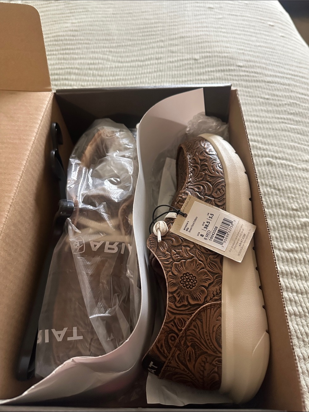 ARIAT Footwear Women's Embossed Floral Slip-On Sneakers in Bronze